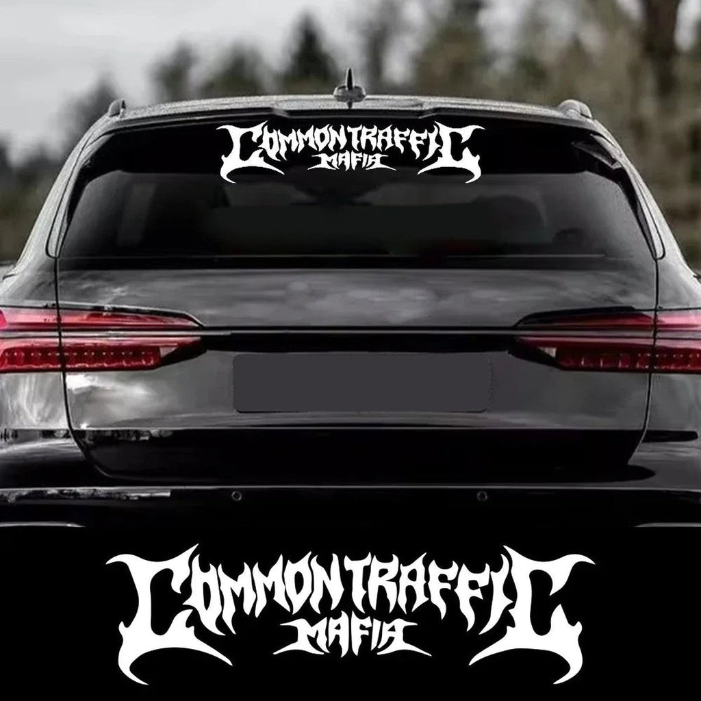 Common Traffic Mafia rear window banner decal on a black wagon