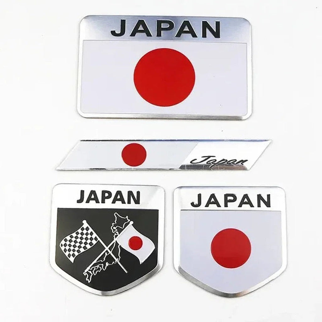 Four Japan flag aluminum emblem badges in different shapes