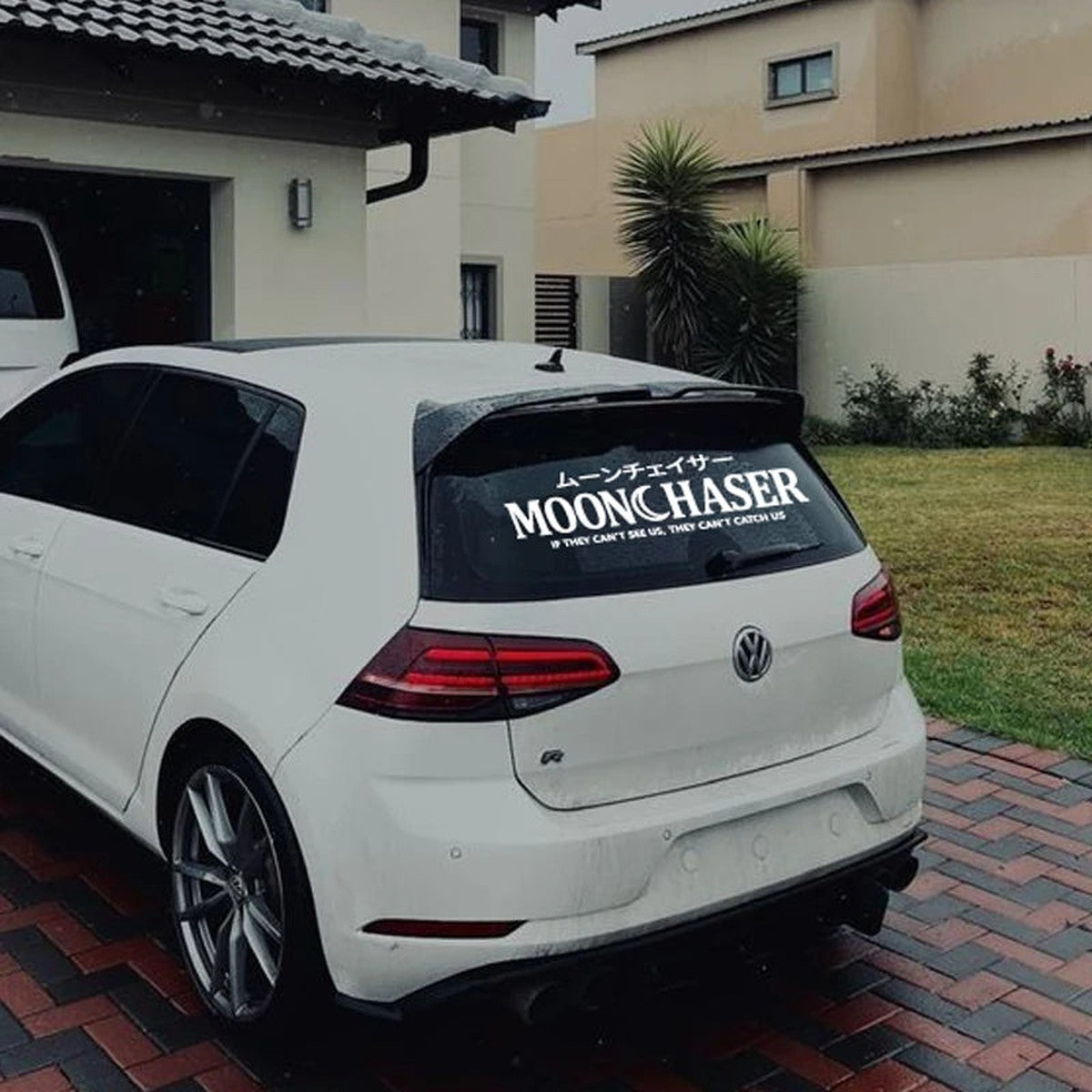 Moonchaser rear window decal on a white Volkswagen Golf