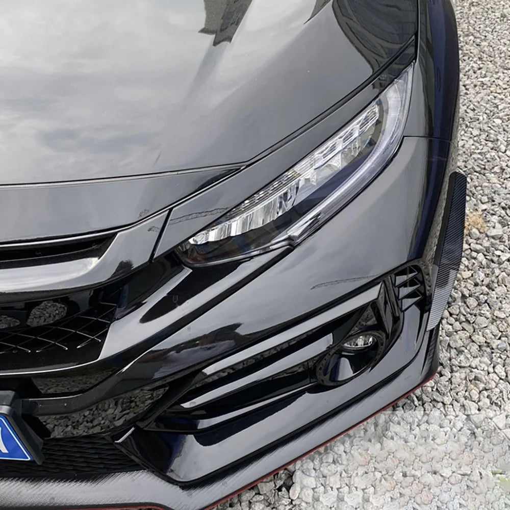 Canard mounted on the front bumper corner of a dark 10th gen Civic
